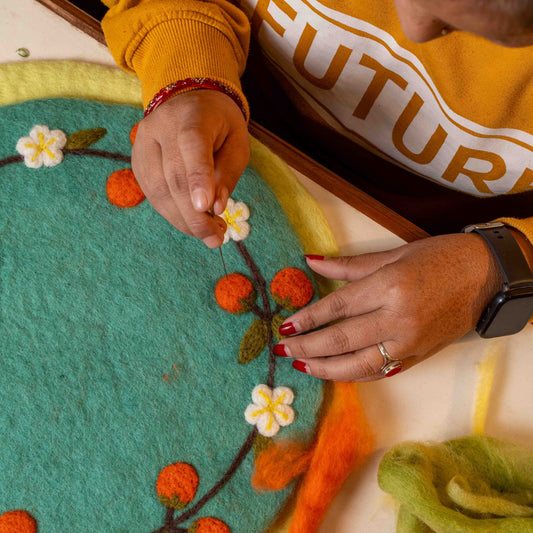 Detailfoto van vilten onderzetter 35 cm sinaasappel