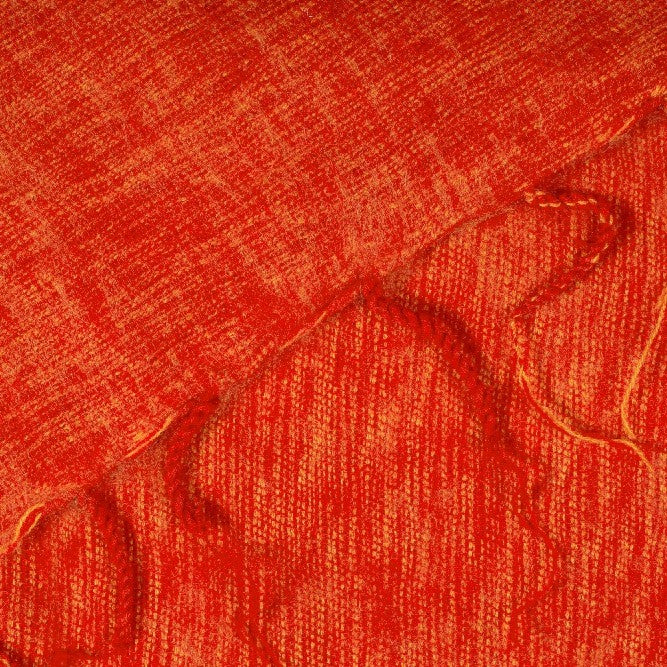 Detailfoto van sjaal warm oranje