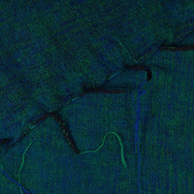 Detailfoto van vilten kleine sjaal aquagroen