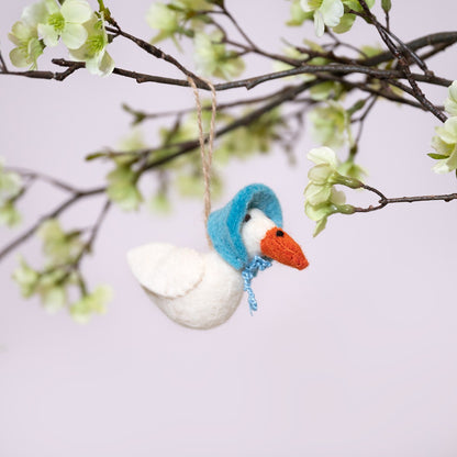 Detailfoto van vilten hanger gans turquoise