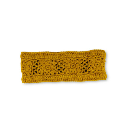 Detailfoto van haarband granny square okergeel