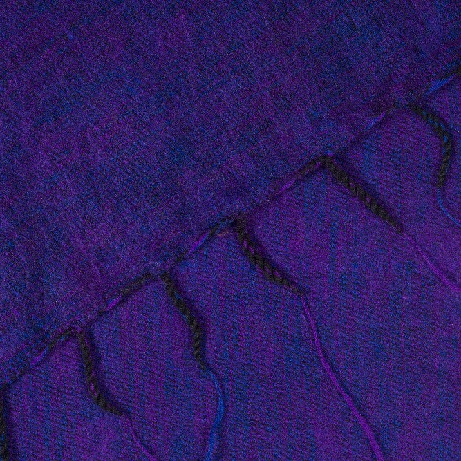 Detailfoto van sjaal paars