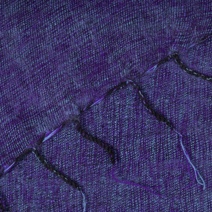 Detailfoto van plaid paars gemêleerd