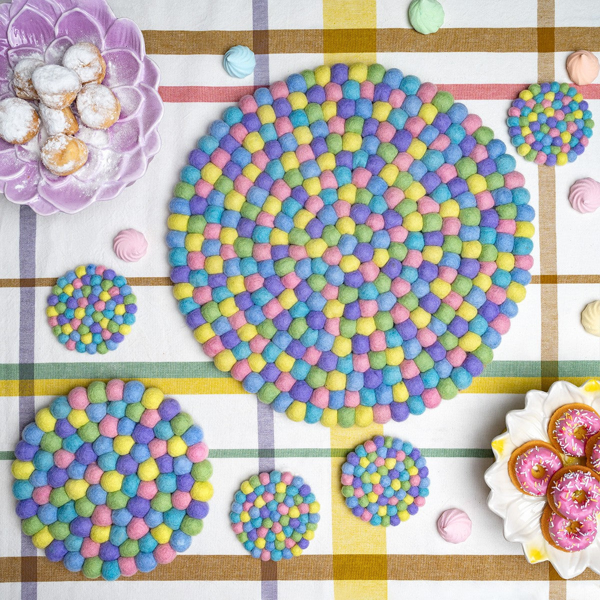 Detailfoto van vilten onderzetter vb 10 cm rond pasteltinten 4 st.