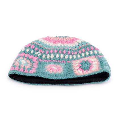 Detailfoto van muts granny square colorful turquoise-roze