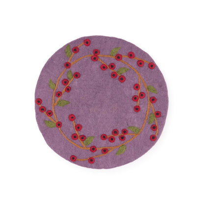 Detailfoto van vilten onderzetter 35 cm bes rood