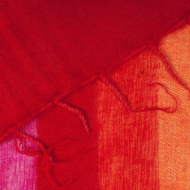 Detailfoto van sjaal fuchsia rood oranje
